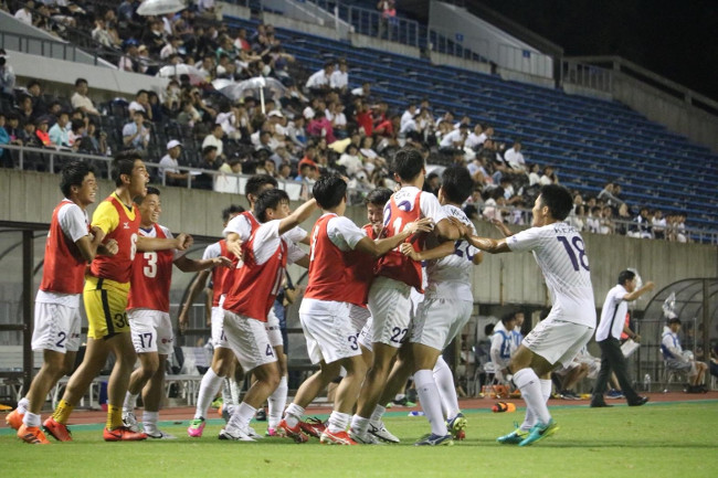 The team celebrates after making the winning goal (Photo: Athletic Association’s Soccer Club)  
