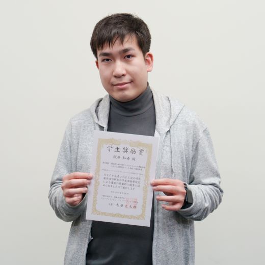 Mr. Furihara with a certificate of merit<br/>
<br/>
<br/>
