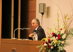 Dr. Jacques Attali answering questions from the audience