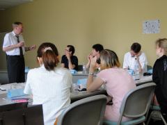 Participants look intently at the lecturer 