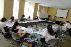 Participants listening to a lecture on Criminal Law.