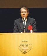 Dean Abe addresses the ceremony