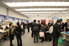 University booths bustling with high school students