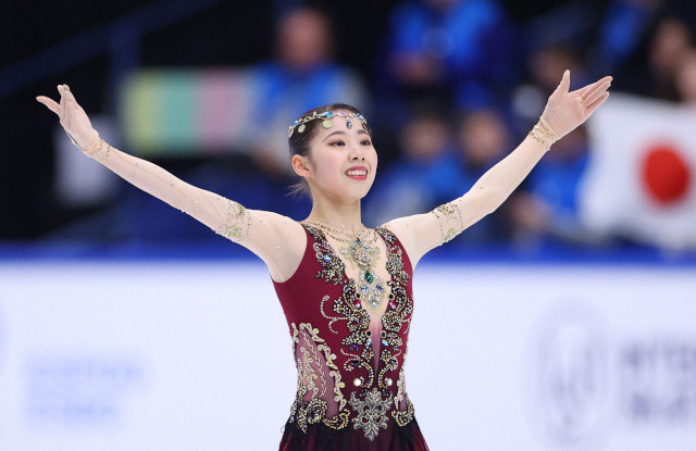 SUMIYOSHI, smiling after completing her short program<br/>
(Mainichi/AFLO)<br/>
<br/>
