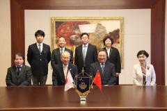 President Fukumiya (first row second from left), Vice President Katsu (far right), and the delegation from the Central University of Finance and Economics