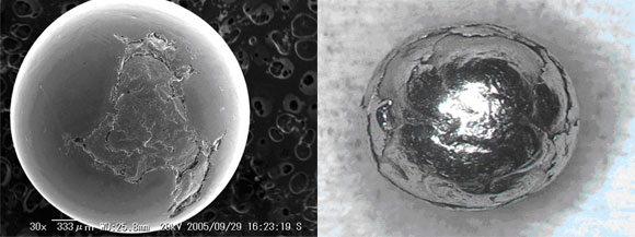 Fig. 5 Spalling initiated on ball surface after running 26.6~106rev and 13.2~106rev
